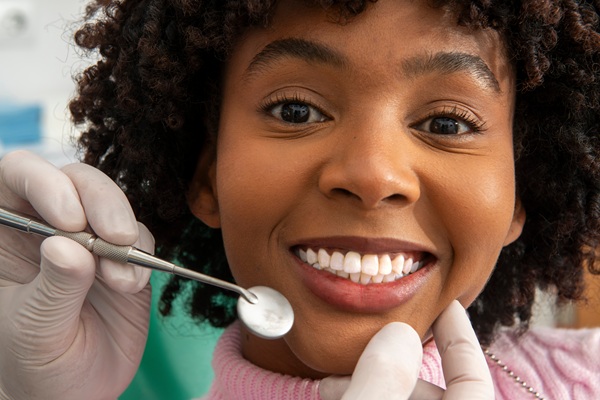 Dental Bonding Explained: How It Fixes Chips, Gaps &# ; Stains